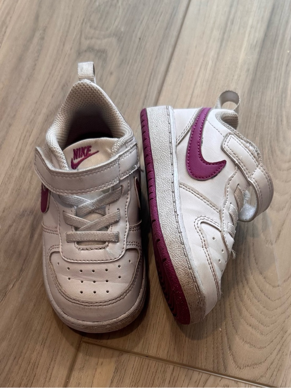 Nike Kids White Sneakers with Pink Swoosh